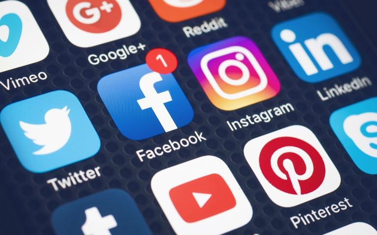 Showing social media icons on smartphone.