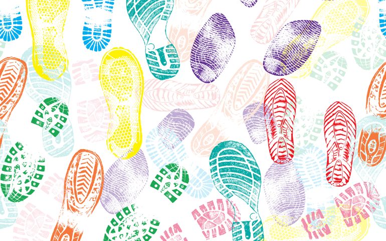 Colorful seamless pattern of shoe prints