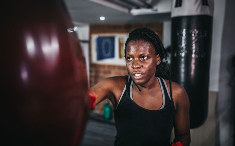 woman boxing at the gym