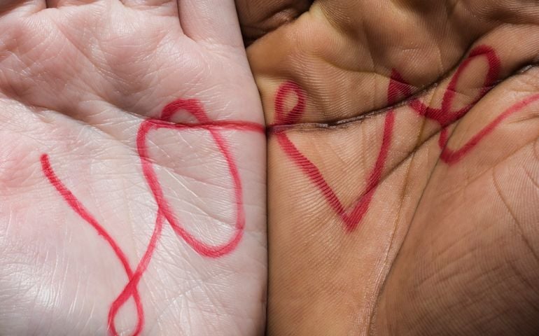 Love written across two hands