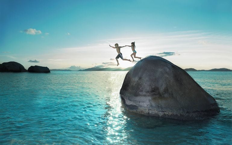 The large rocks are at The Baths on the island of Virgin Gorda among the British Virgin Islands in the Caribbean.