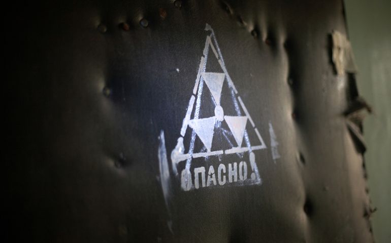 Close-up of a Radiation warning sign on the door, Prypiat, Ukraine