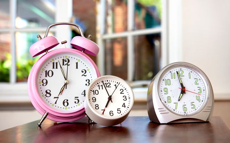 obsessively setting three alarm clocks for the same time to prevent over sleeping