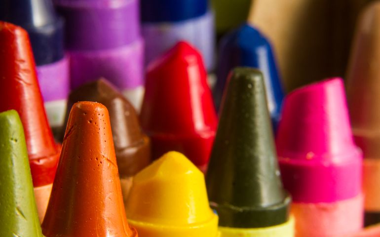 Box of crayons with a shallow depth of field and slightly angled