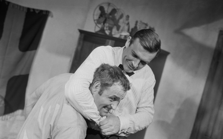 British actor Sean Connery as 'James Bond' rehearsing stunts scenes with British stunt performer, stunt coordinator and arranger Alf Joint (1927 - 2005) on the set of spy film 'Goldfinger', third movie in the James Bond series, UK, 20th March 1964.