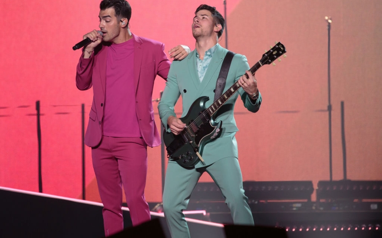 Nick Jonas and Joe Jonas of Jonas Brothers perform at Sprint Center on September 22, 2019 in Kansas City, Missouri.