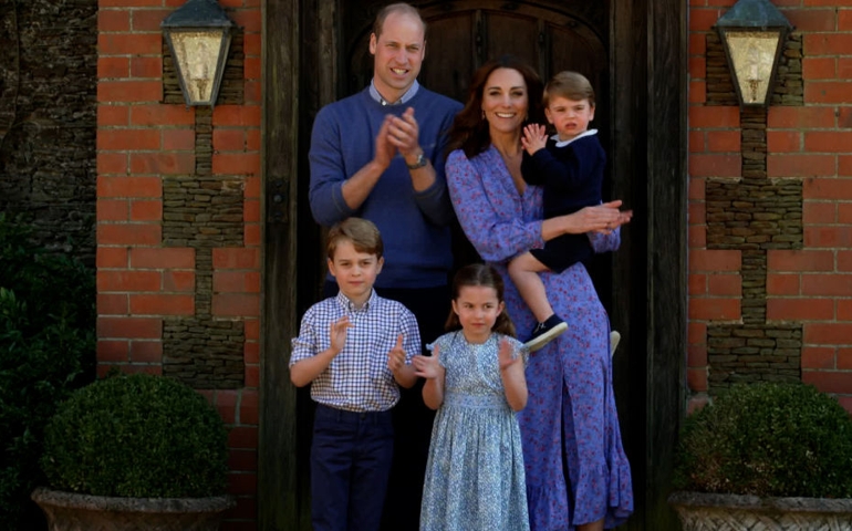 In this screengrab, Prince William, Duke of Cambridge, Catherine Duchess of Cambridge, Prince George of Cambridge, Princess Charlotte of Cambridge and Prince Louis of Cambridge clap for NHS carers as part of the BBC Children In Need and Comic Relief 'Big Night In at London on April 23, 2020 in London, England.The 'Big Night In' brings the nation an evening of unforgettable entertainment in a way we've never seen before. Raising money for and paying tribute to those on the front line fighting Covid-19 and all the unsung heroes supporting their communities.