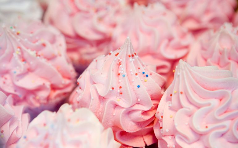 Pink icing on cakes.
