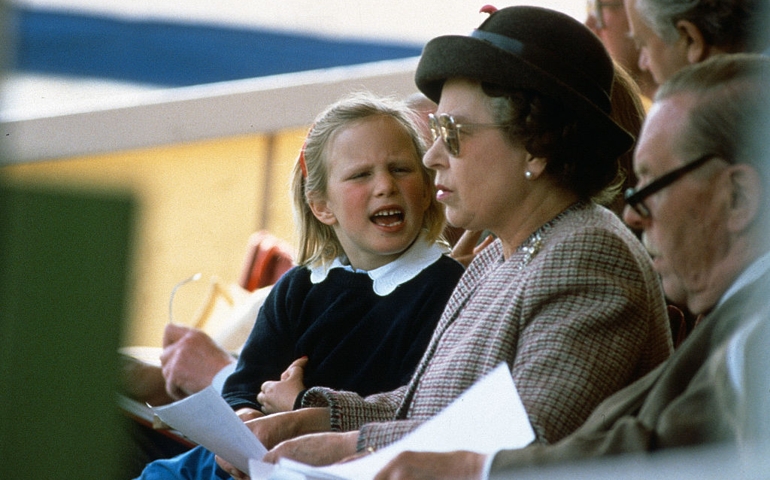 Queen Elizabeth ll chats to her granddaughter Zara Phillips at the Royal Windsor Horse Show on May 24, 1987 in Windsor, England.