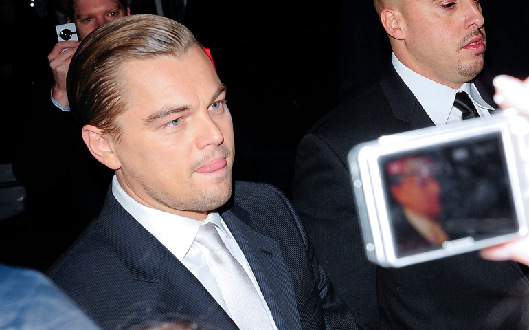 Actor Leonardo DiCaprio signs autographs for fans at the Ziegfeld Theater on February 17, 2010 in New York City.