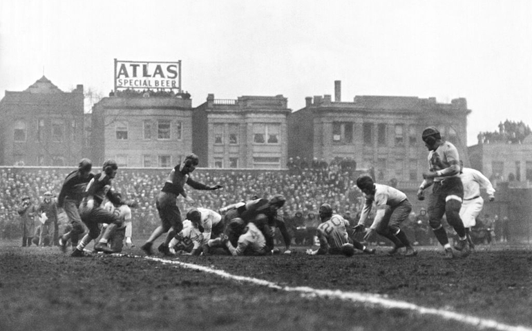 The Chicago Bears recover their quarterback's fumble and go on to win the first scheduled NFL Football Championship game over the New York Giants at Wrigley Field in Chicago by a score of 23-21, Chicago, Illinois, December 17, 1933.