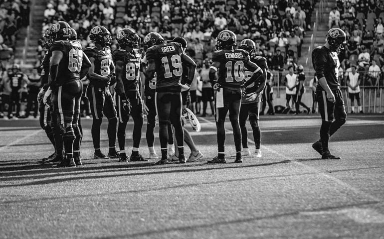 Toronto Argonauts Offence huddle after the play during Winnipeg Blue Bombers at Toronto Argonauts game at BMO Field in Toronto, ON