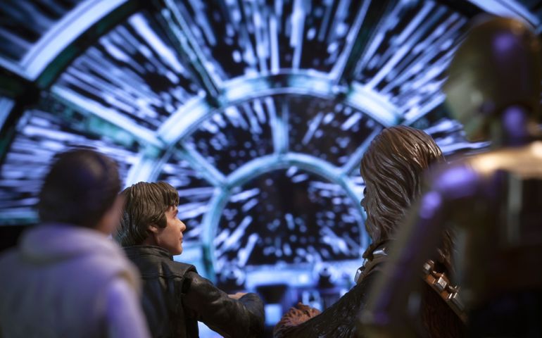 Corellian freighter Millennium Falcon travels through Hyperspace
