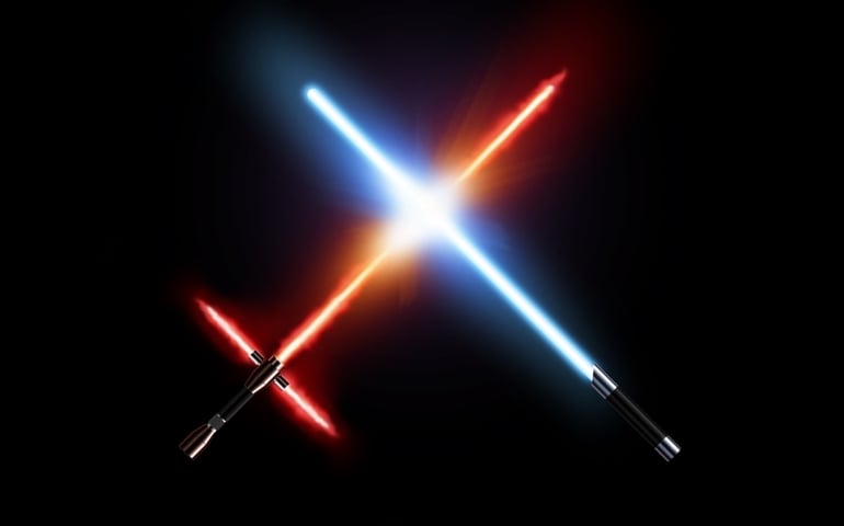 Light saber fight, red and blue isolated on black