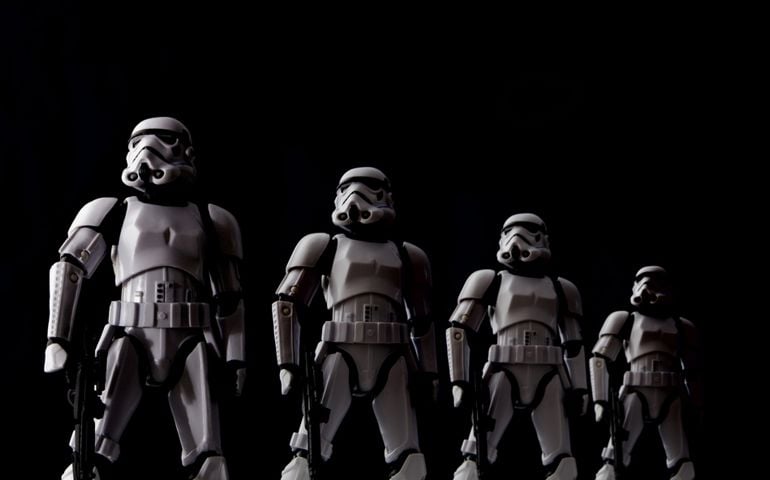 Star Wars Stormtroopers lined up with dramatic lighting