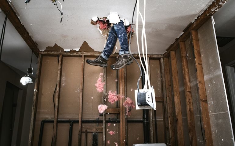 A man attempts to work on renovating his home, with funny and disastrous results. He falls through the drywall ceiling feet first.