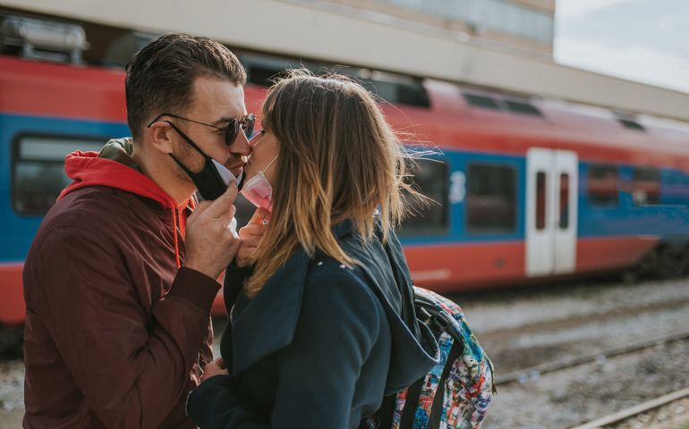 Couple meeting at the train station.