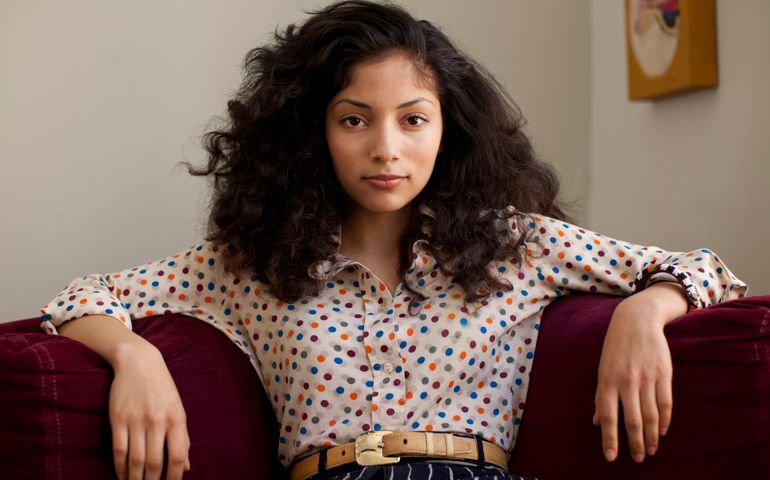 Portrait of young hispanic woman