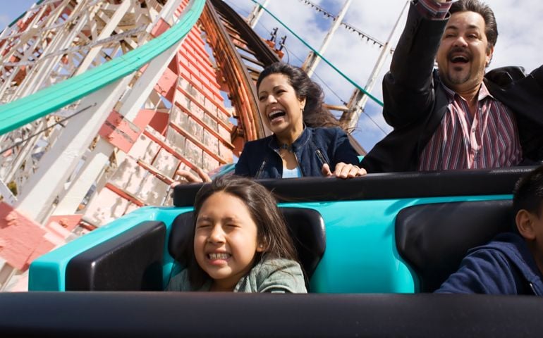 Family riding rollercoaster