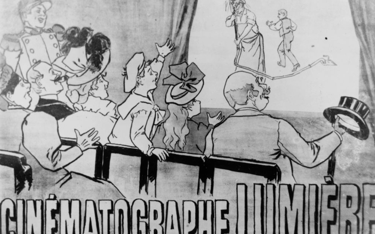 A drawing entitiled 'Cinematographe Lumiere' illustrating the joys of Louis Lumiere's early cinema. The audience are laughing at a man getting a faceful of water from a hose -'L'arroseur Arrose'.