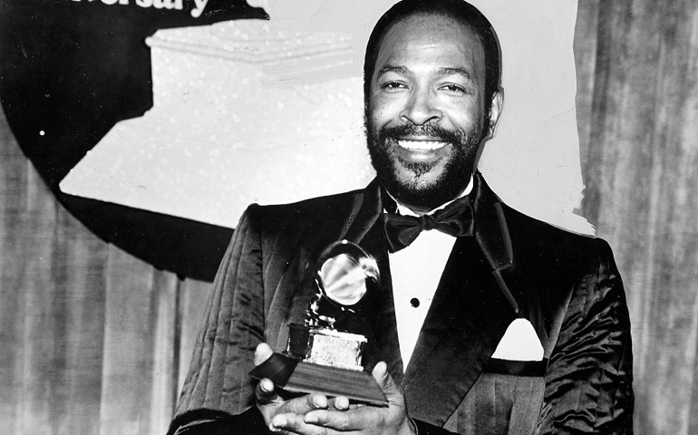 Marvin Gaye holding a Grammy award, 1982.