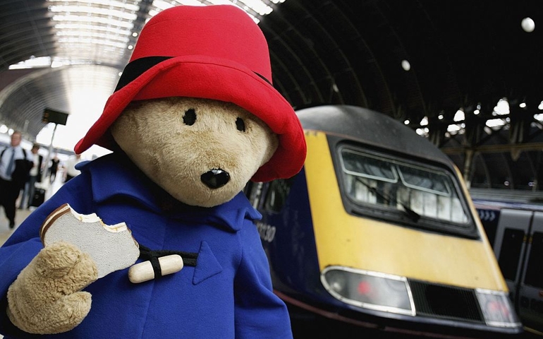 LONDON - JUNE 23: Paddington Bear arrives at Paddington Station 'on his way' to the children's literature event at Buckingham Palace on June 23, 2006 in London, England.