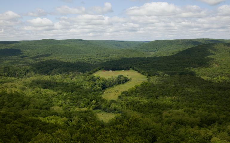 Question mark in mountain valley