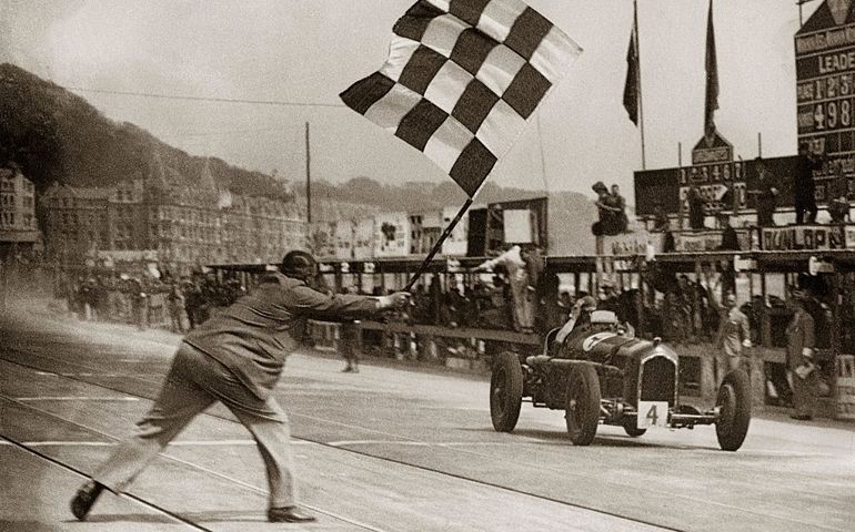UNITED STATES - CIRCA 1930: Erian Lewi wins with Alfa Romeo the car-race. Douglas, Isle of Man. Photograph. 1934