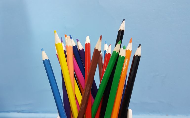 pencils colors on a blue background