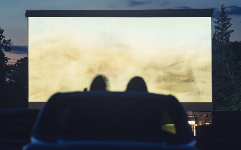 Movie goers enjoy a drive in movie for the first time in 2020.