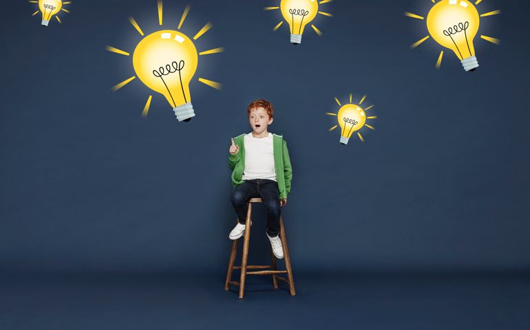 Boy with lightbulbs