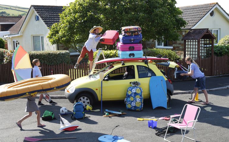 Family packing car for holiday