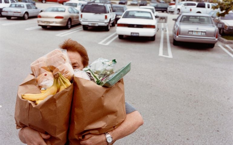 Man Carrying Grocery Bags