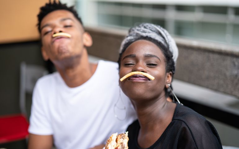 Group of young people having fun in a restaurant