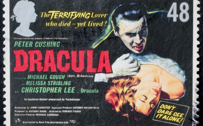 Vintage poster of movie Dracula on postage stamp