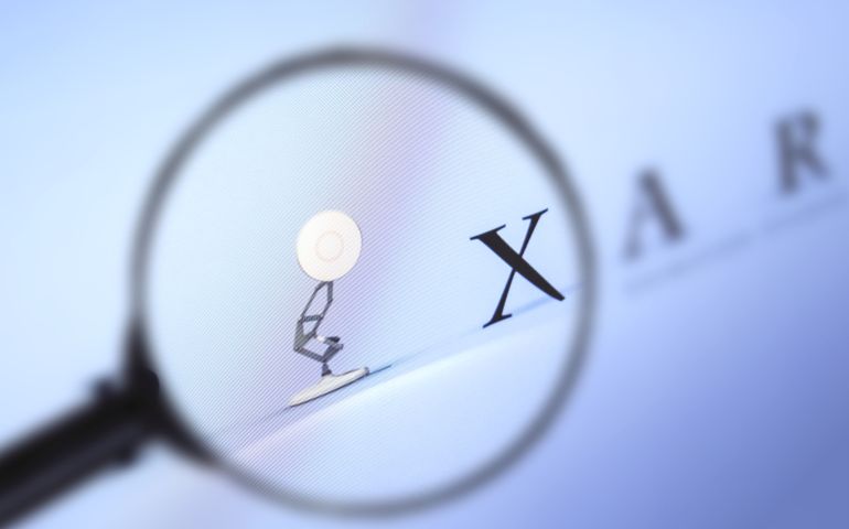 Pixar home page, view through a magnifying glass