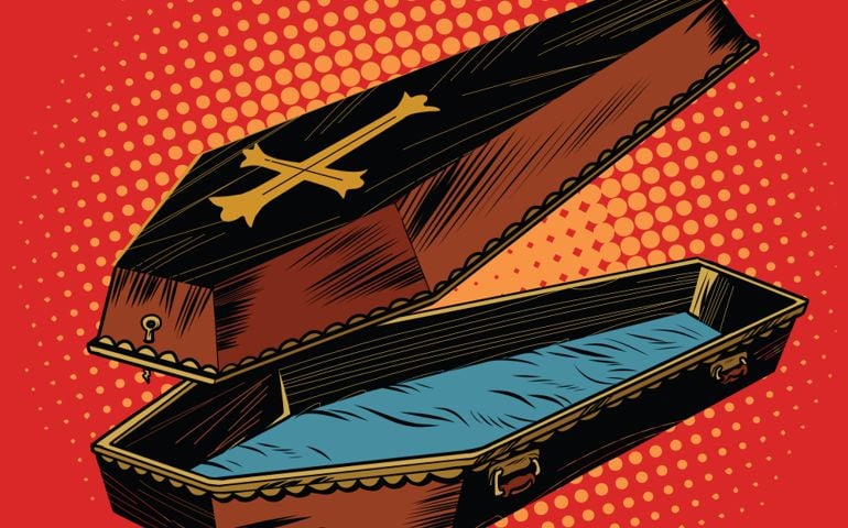wooden coffin with Christian cross
