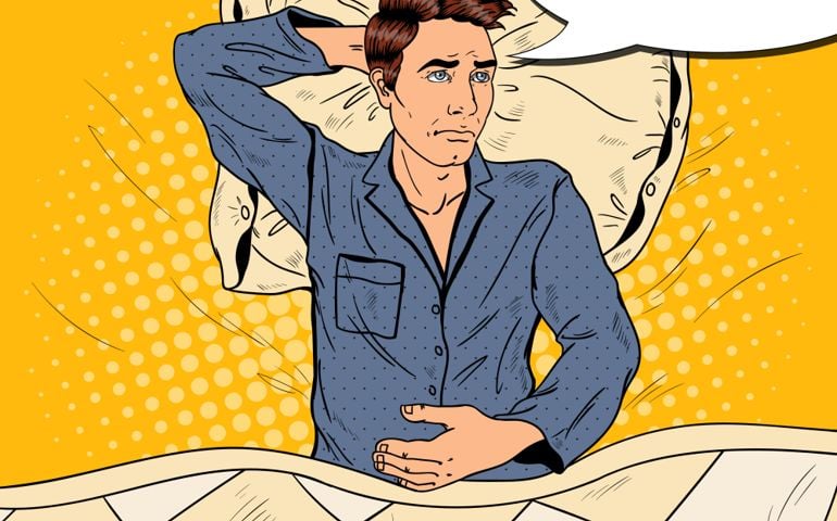 Pop Art Man in Bed Suffering Insomnia and Sleeplessness