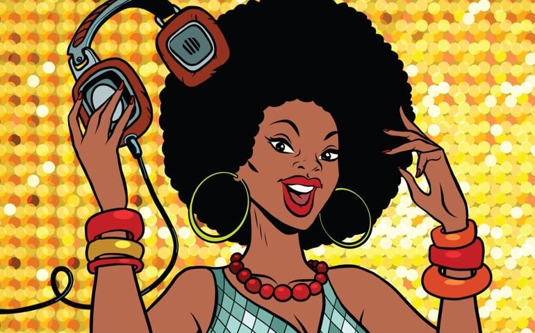 African American woman DJ with headphones