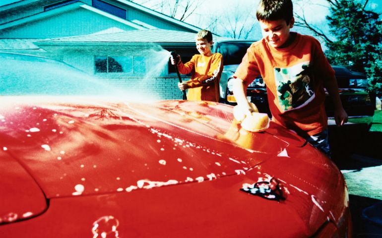 Boys Washing Red Corvette