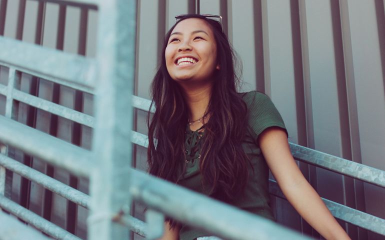 Joyful Trendy Asian Teen Girl