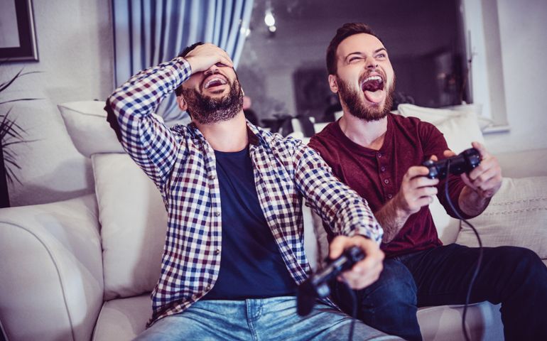 Handsome Man Is Defeating His Older Brother in Video Games