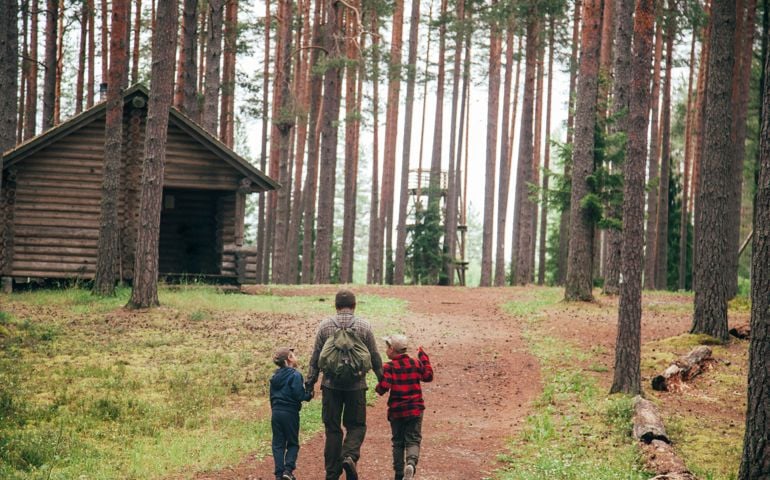 Real family in nordic nature.