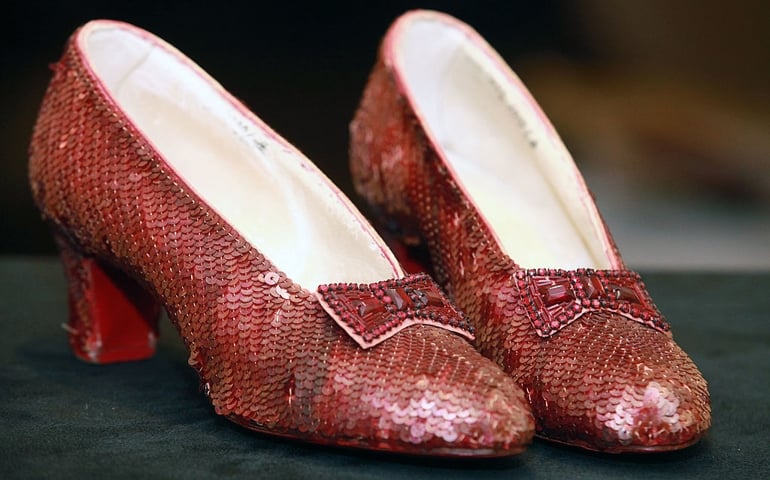 NEW YORK, NY - DECEMBER 05: "The Wizard of Oz" Ruby Red Slippers worn by Judy Garland in 1939 are displayed at a viewing at the Plaza Athenee on December 5, 2011 in New York City. "The Wizard of Oz" Ruby Red slippers are a women's size 5 and appraised at $3 million dollars.
