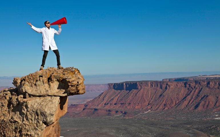 Man yelling into canyon