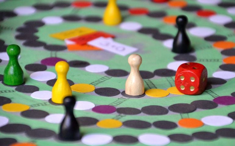 self made board-game with tokens and dice