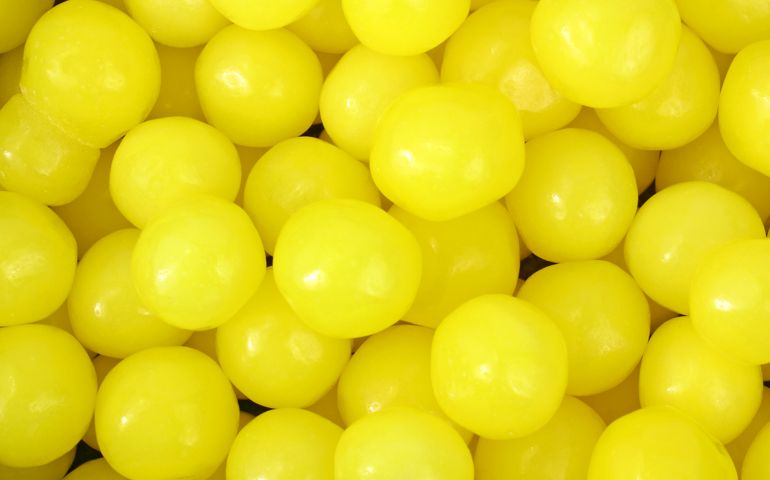 A close view of several pieces of lemon candy.