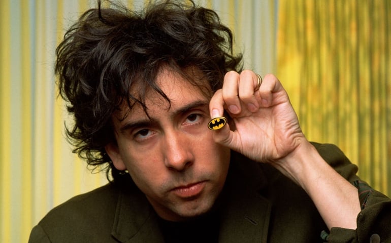 WEST HOLLYWOOD, CA - 1989: Director of the first "Batman" movie and "Batman Returns," Tim Burton, proudly displays a Batman pin during a 1989 West Hollywood, California, photo portrait session. In addition to his "Batman" fame, Burton went on to direct such eclectic hits as "Ed Wood," "Beetle Juice," "Edward Scissorhands," and the "Corpse Bride".