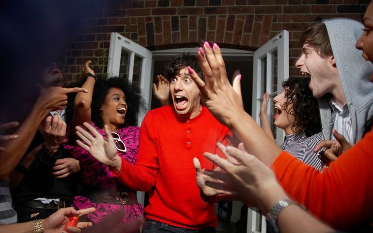 Man being surprised by his friends