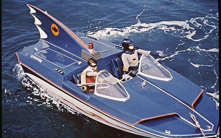 UNITED STATES - CIRCA 1966: Adam West (right) and Burt Ward as Batman and Robin riding the Bat Boat, from the television series "Batman", 1966.